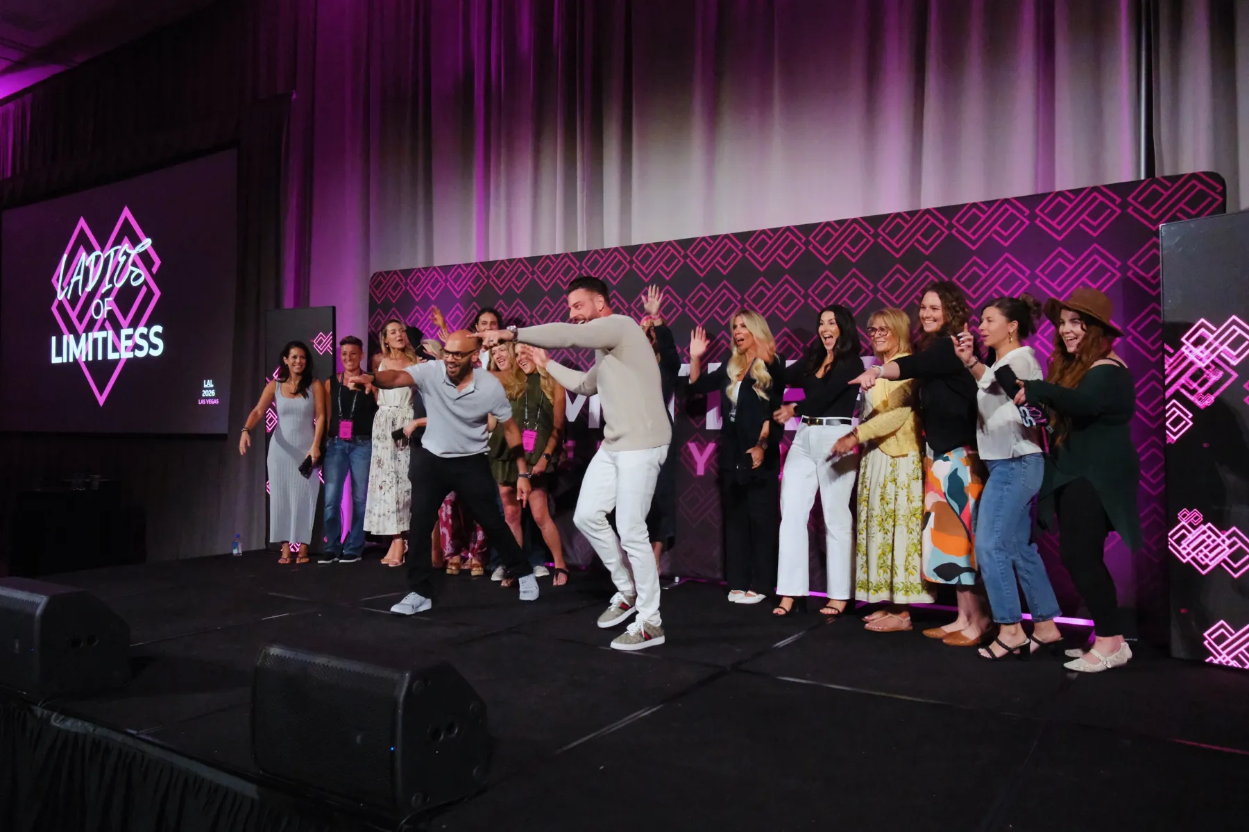 Ladies of Limitless celebrating on stage